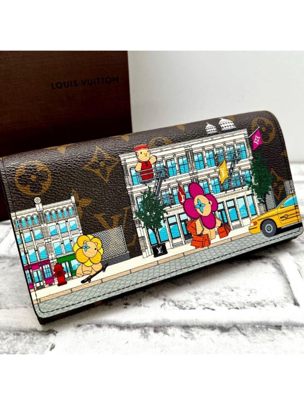 Louis Vuitton Vivienne Portefeuille Sarah Wallet